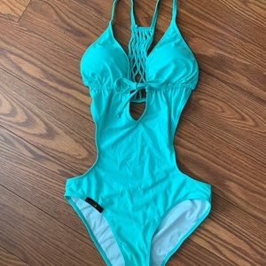 Turquoise body suit